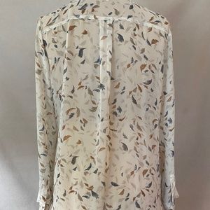 Pretty long sleeve blouse, sheer cream colored button-down in leaf pattern